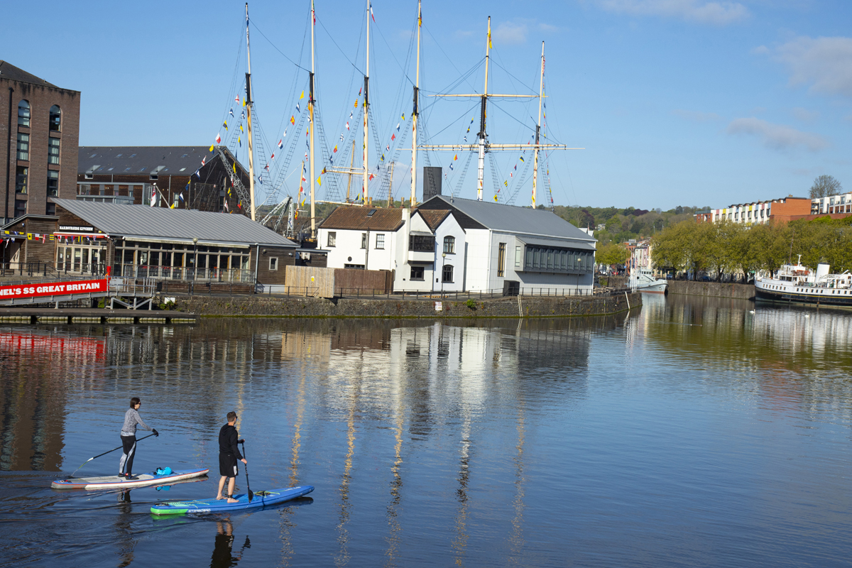 Harbourside showing water and paddleboarders