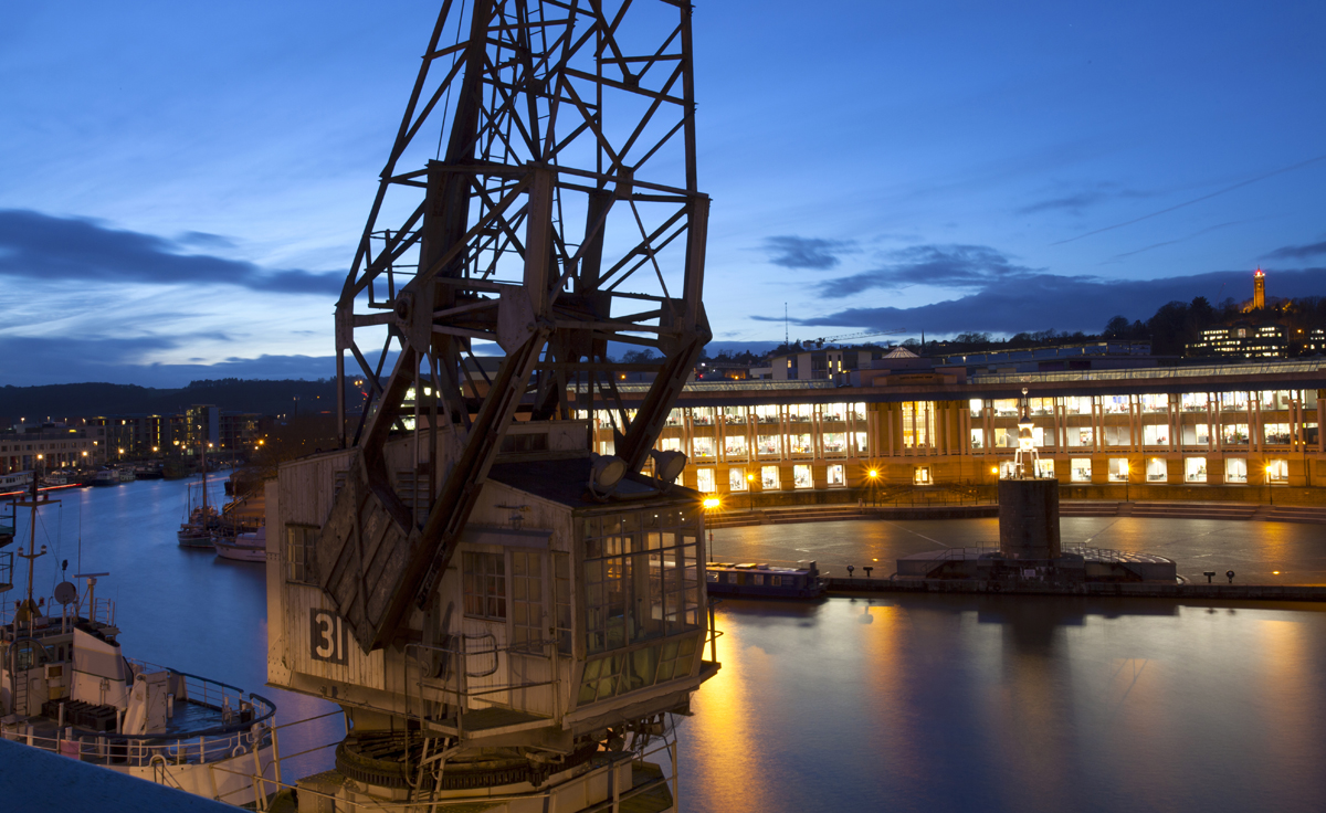 Mshed night shot showing a crane and the water