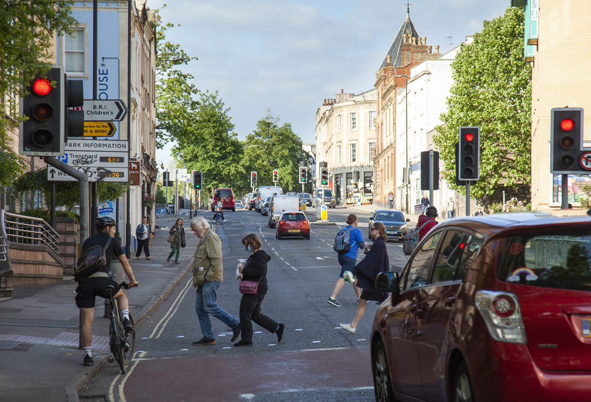 Street showing traffic lights and pedestrians