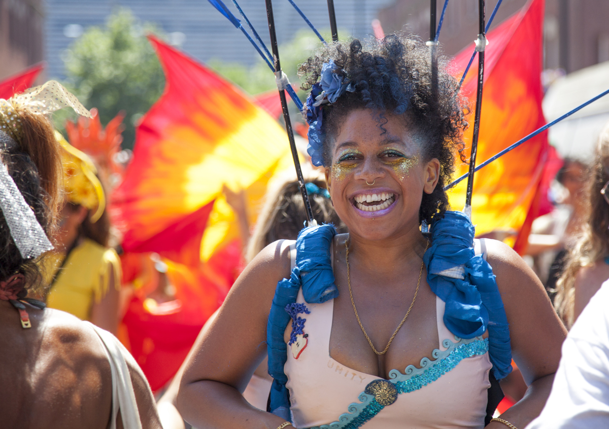 ST PAUL'S CARNIVAL - smiling woman wearing carnival itire