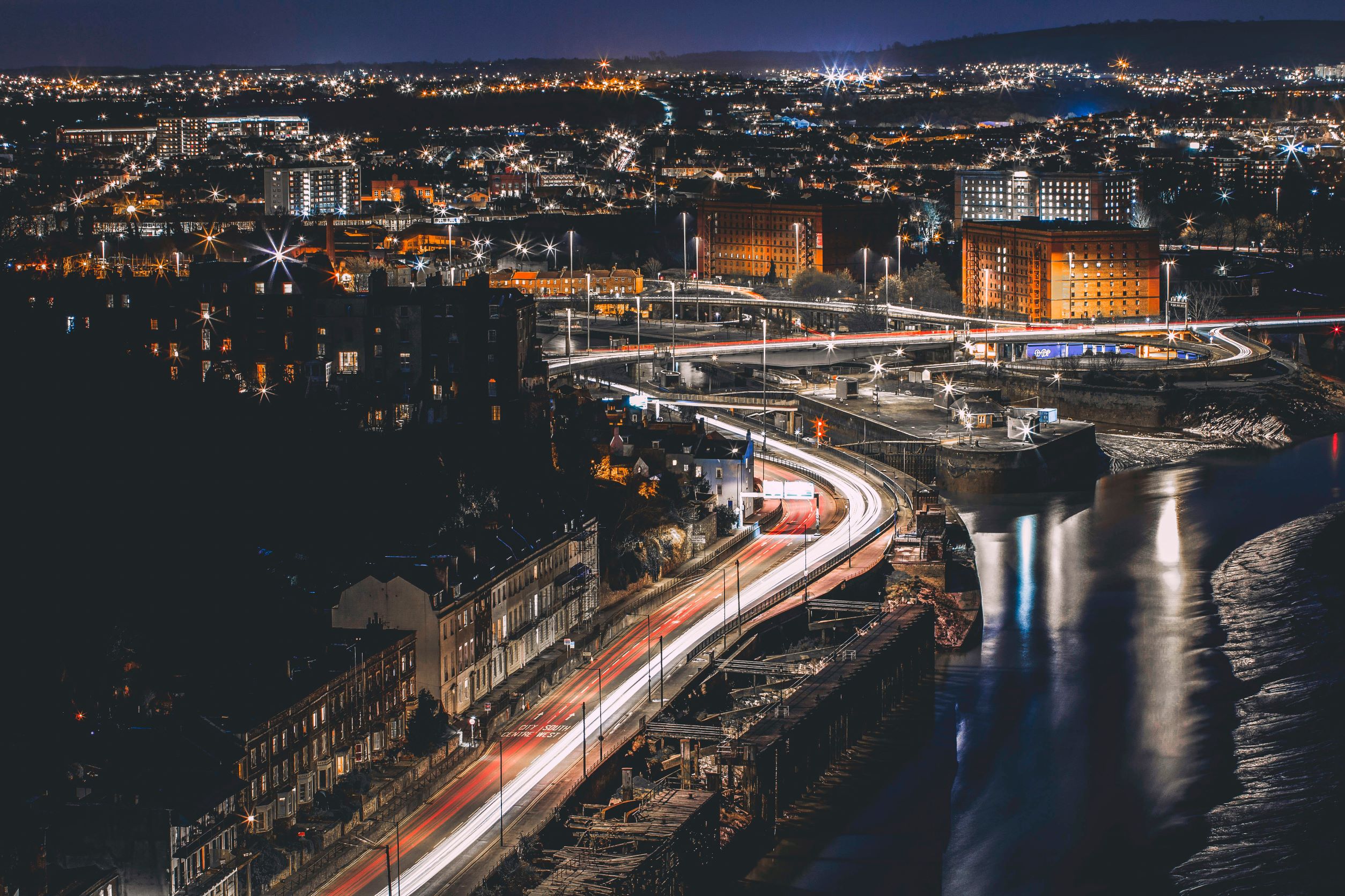 Aerial shot of Bristol showing time lapse of traffic through the town