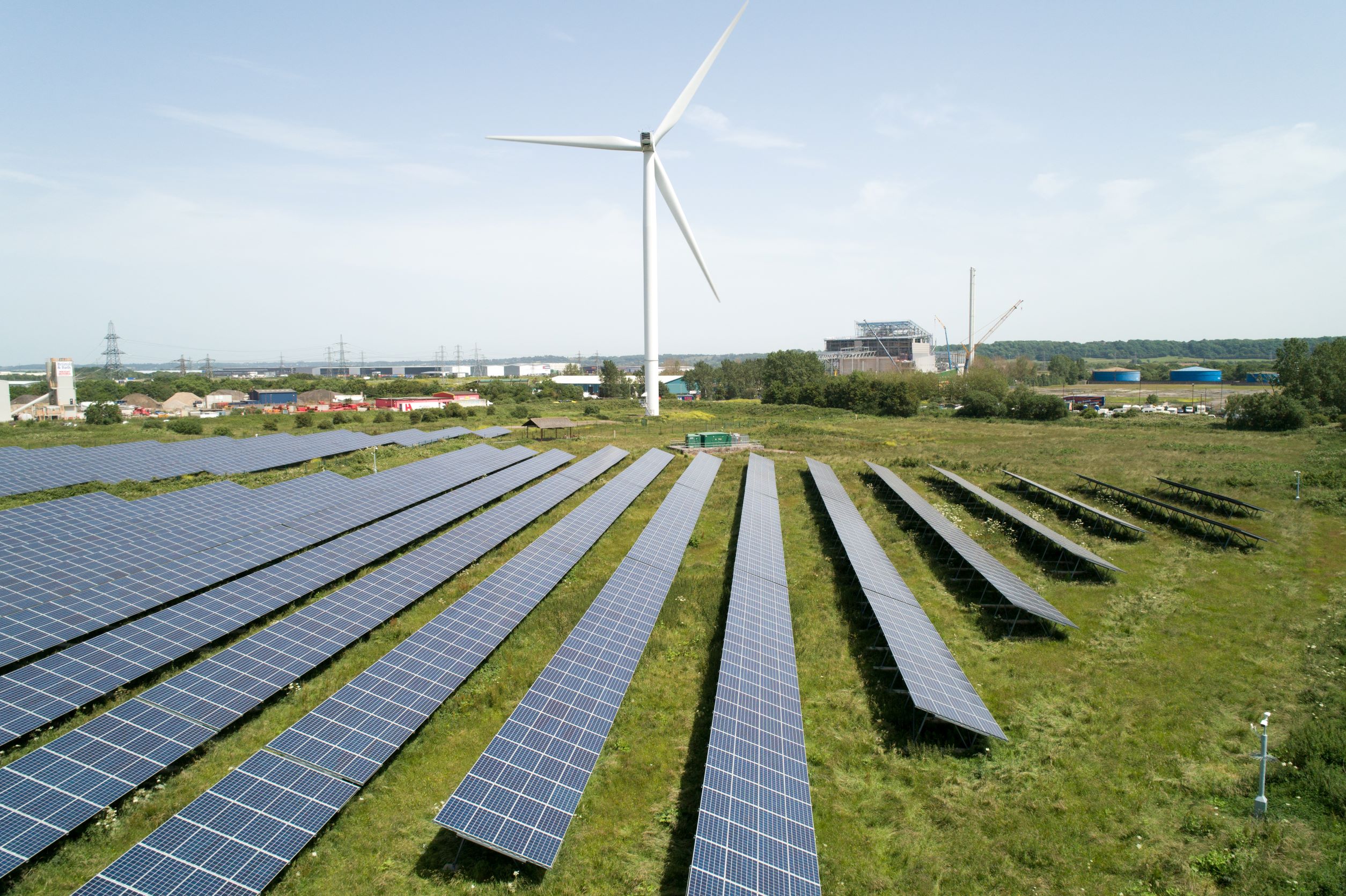 Image of windfarm with wind turbineand solar panels