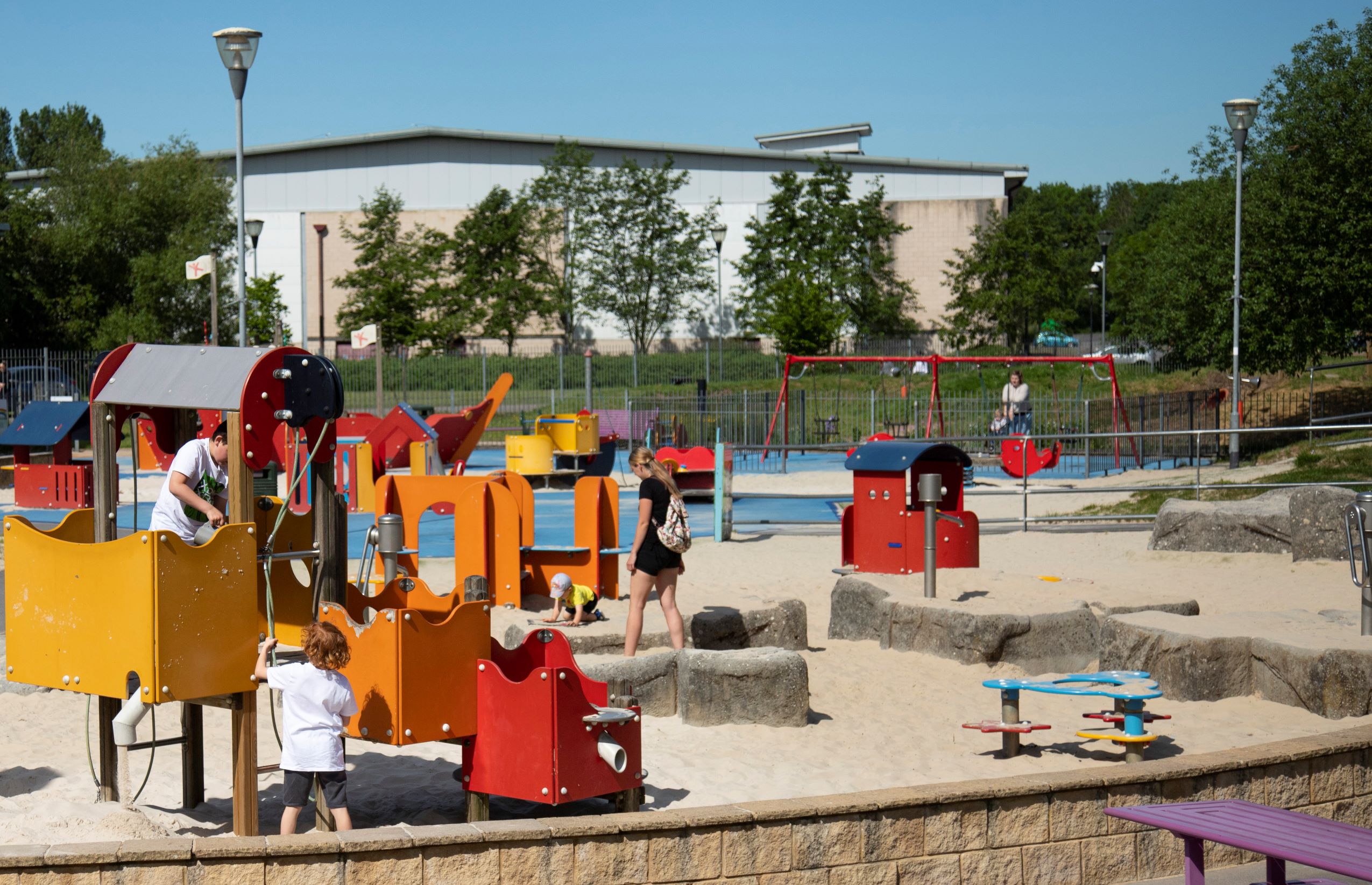 Children's play park with sand pit and climbing apparatus